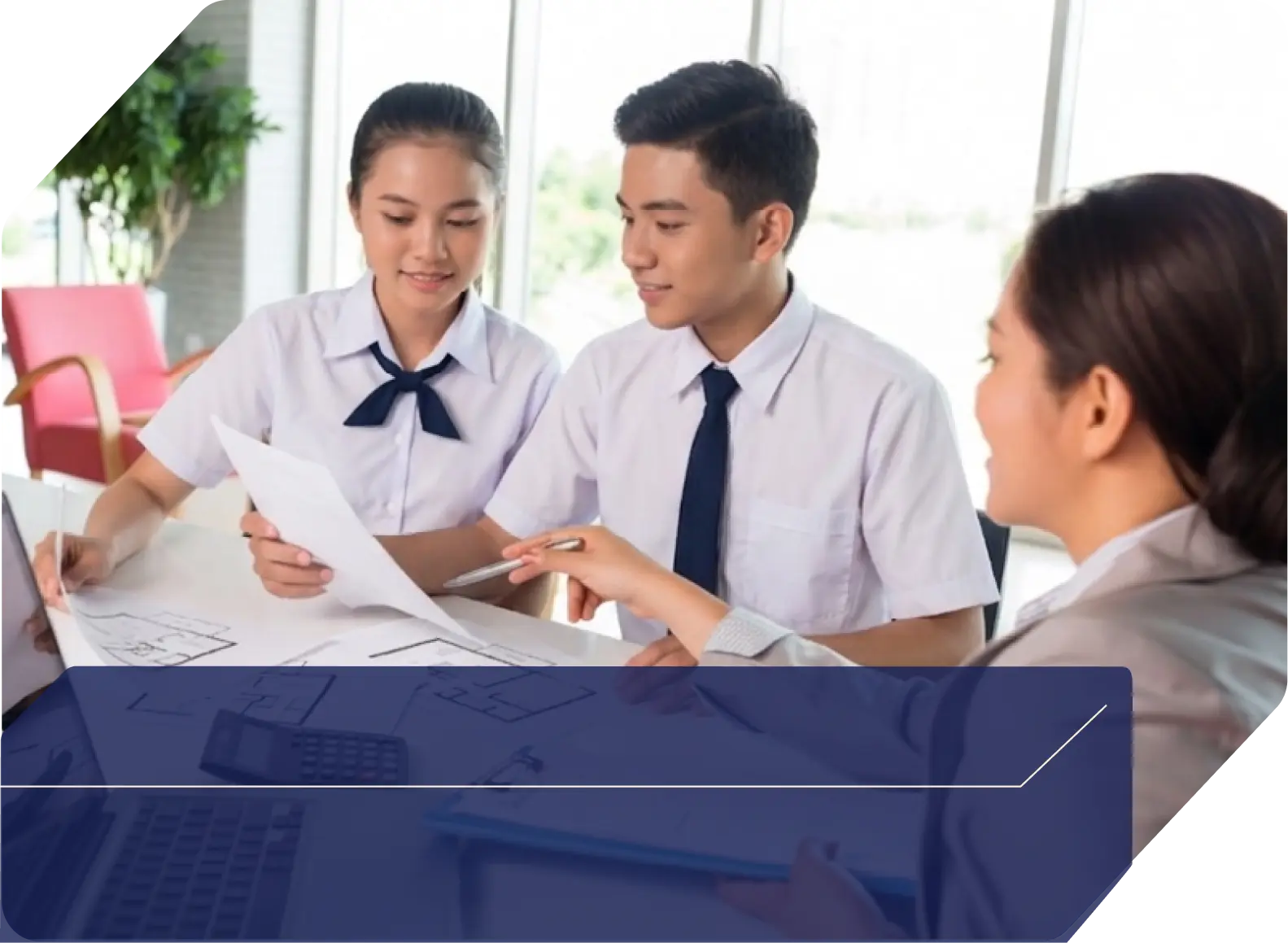 Students collaborating over documents